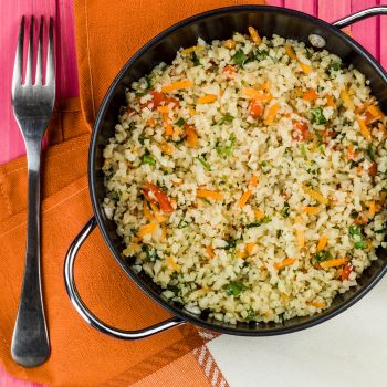 Low Carb Healthy Cauliflower Rice Pan Dish with Vegetables and Herbs
