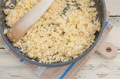 Cauliflower Rice Cooking in a Pan